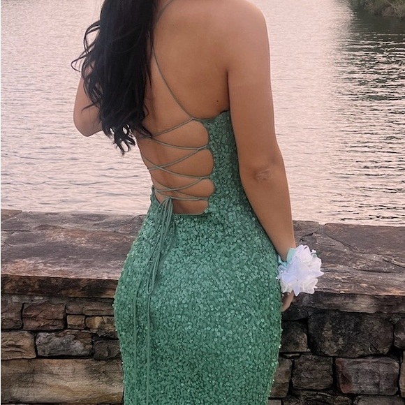 Only wore once and dry cleaned. Beautiful aloe green dress - Picture 2 of 3